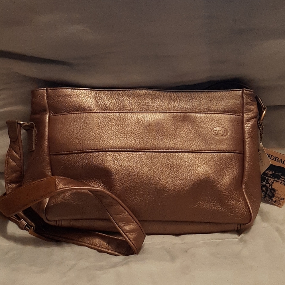 S.A.S. Handbag - New, Crossbody, (Dawn Copper) w/adjustable strap.